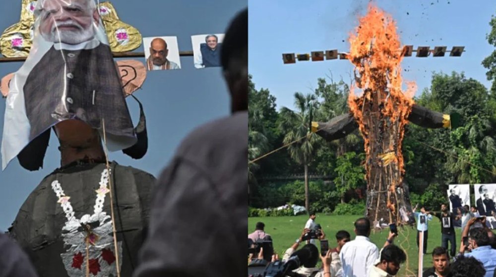 রাবণের মুখে মোদি – ট্রাম্প  – দোভাল – আম্বানির ছবি লাগিয়ে কুশপুত্তলিকা দাহ